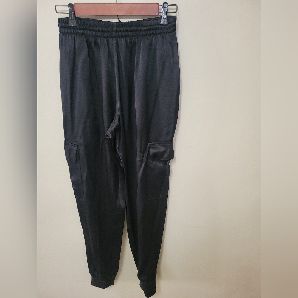 Good American black satin joggers